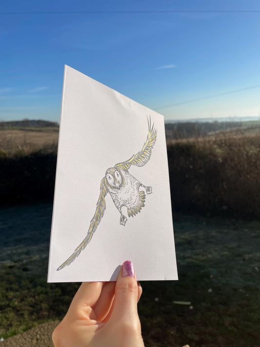 A5 Puffin card with hand painted gold ink details