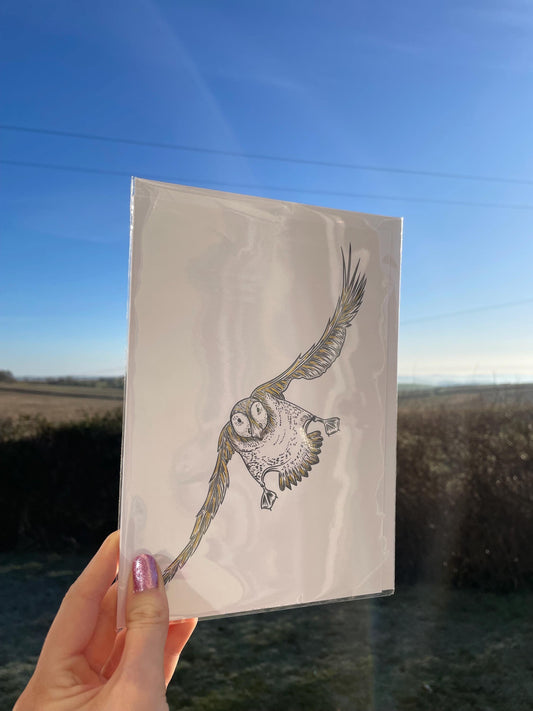 A5 Puffin card with hand painted gold ink details